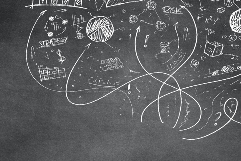chalkboard filled with math and analytics computations.