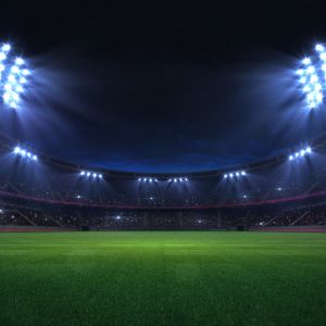 Sport stadium lit up at night